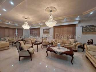 Formal living room classic style with chandeliers sofas marble floors house for sale colon panama