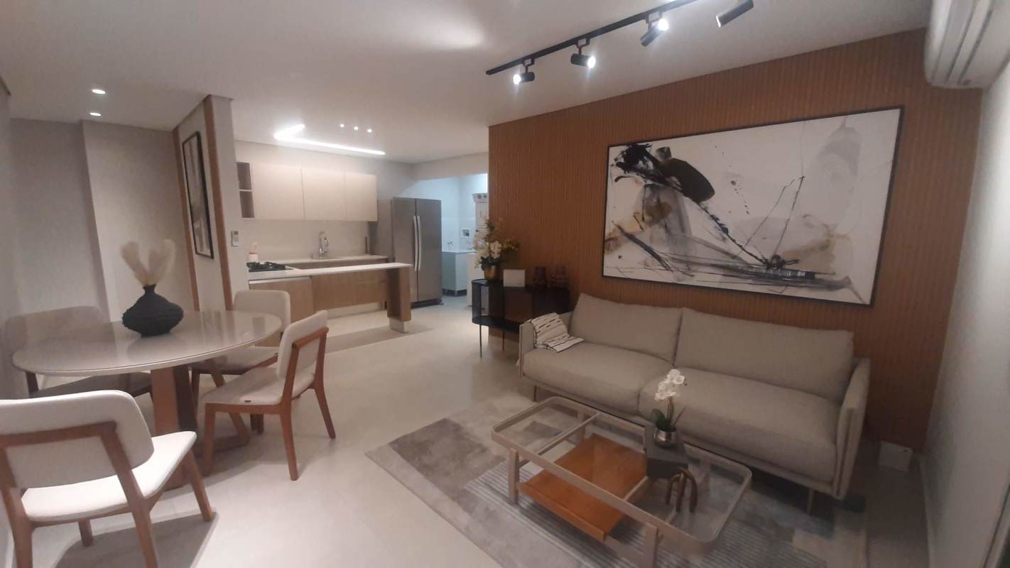 Living and kitchen area with modern furnishings PH Condado View Tower 200 Panama City