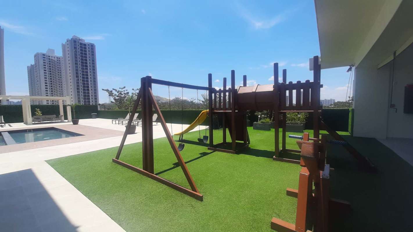 Outdoor pool and children's playground with pergola in Condado View Panama City