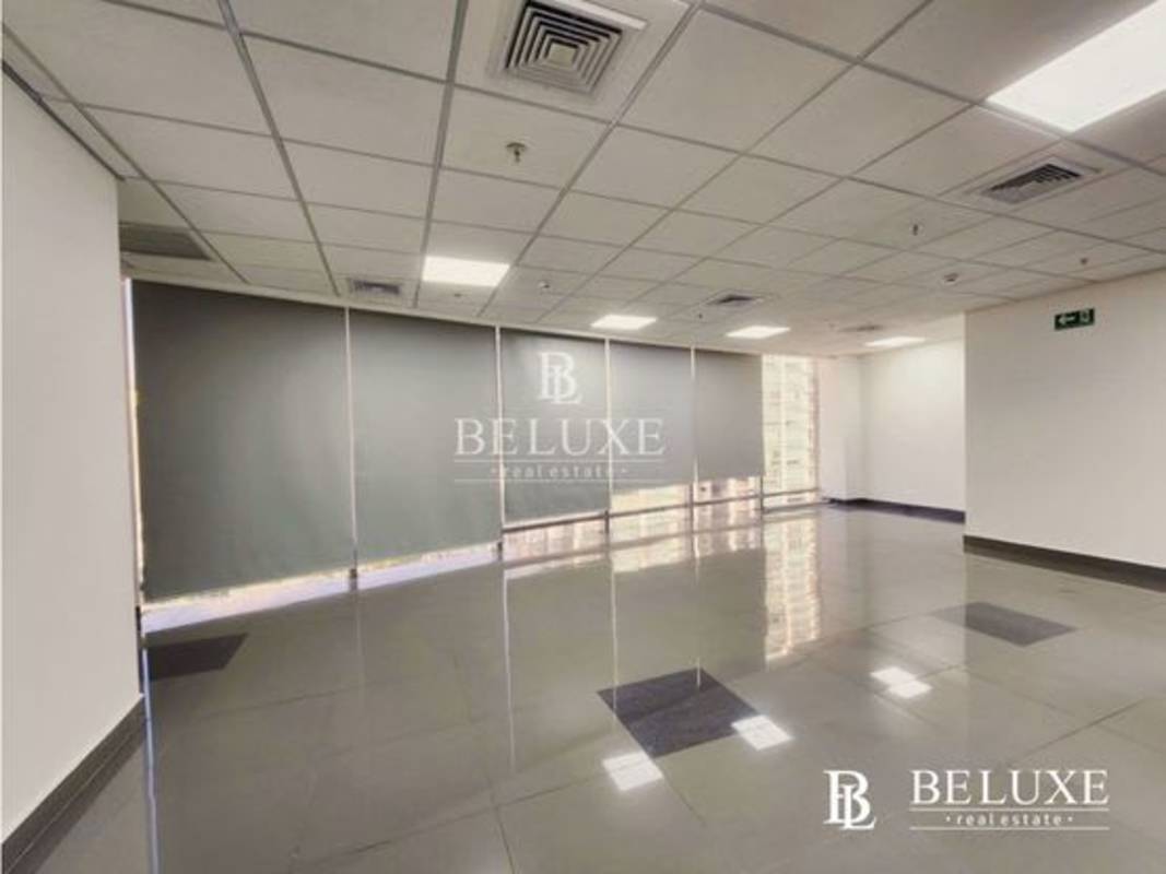 Open floor office space with panoramic window views in PH Aseguradora Ancón Costa del Este Panama