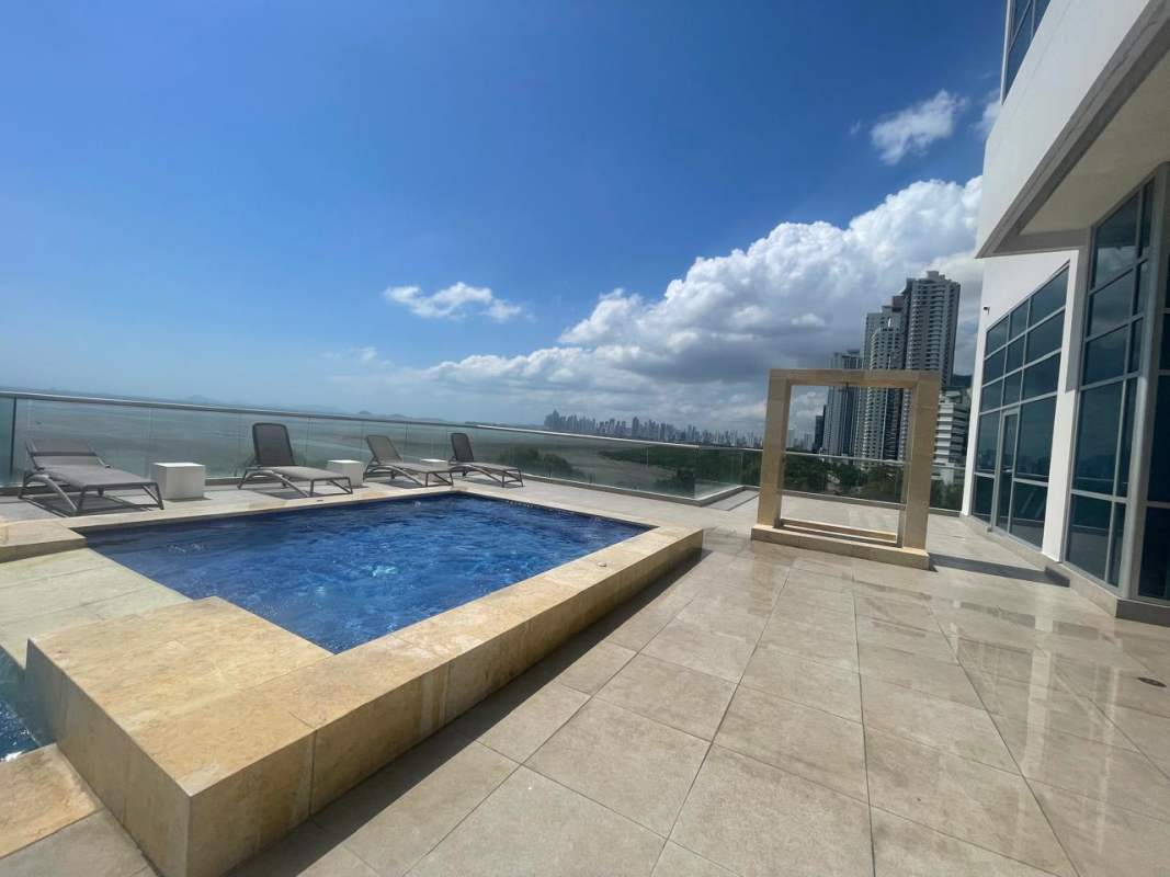 Large modern kitchen with granite counters and stainless appliances at Ten Tower