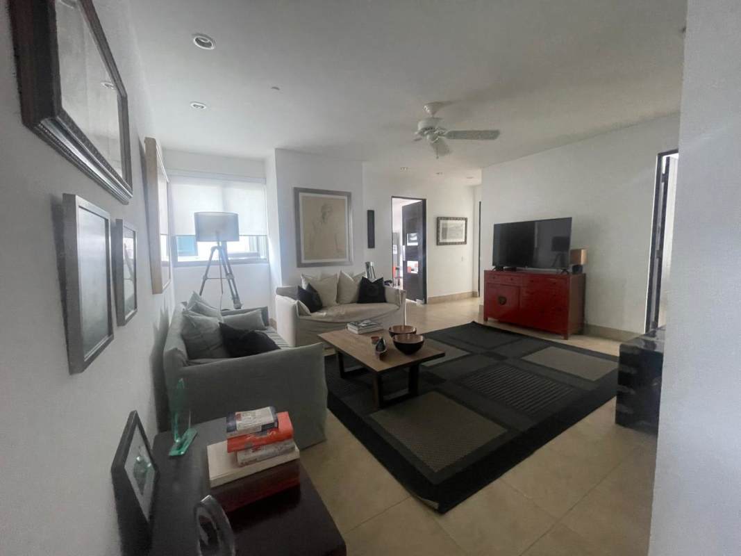 Master bedroom featuring large windows and Pacific Ocean view in Costa del Este