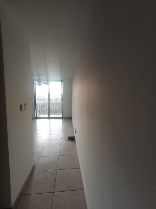 Living room with tile floors and balcony in PH Mystic Towers apartment for rent Panama
