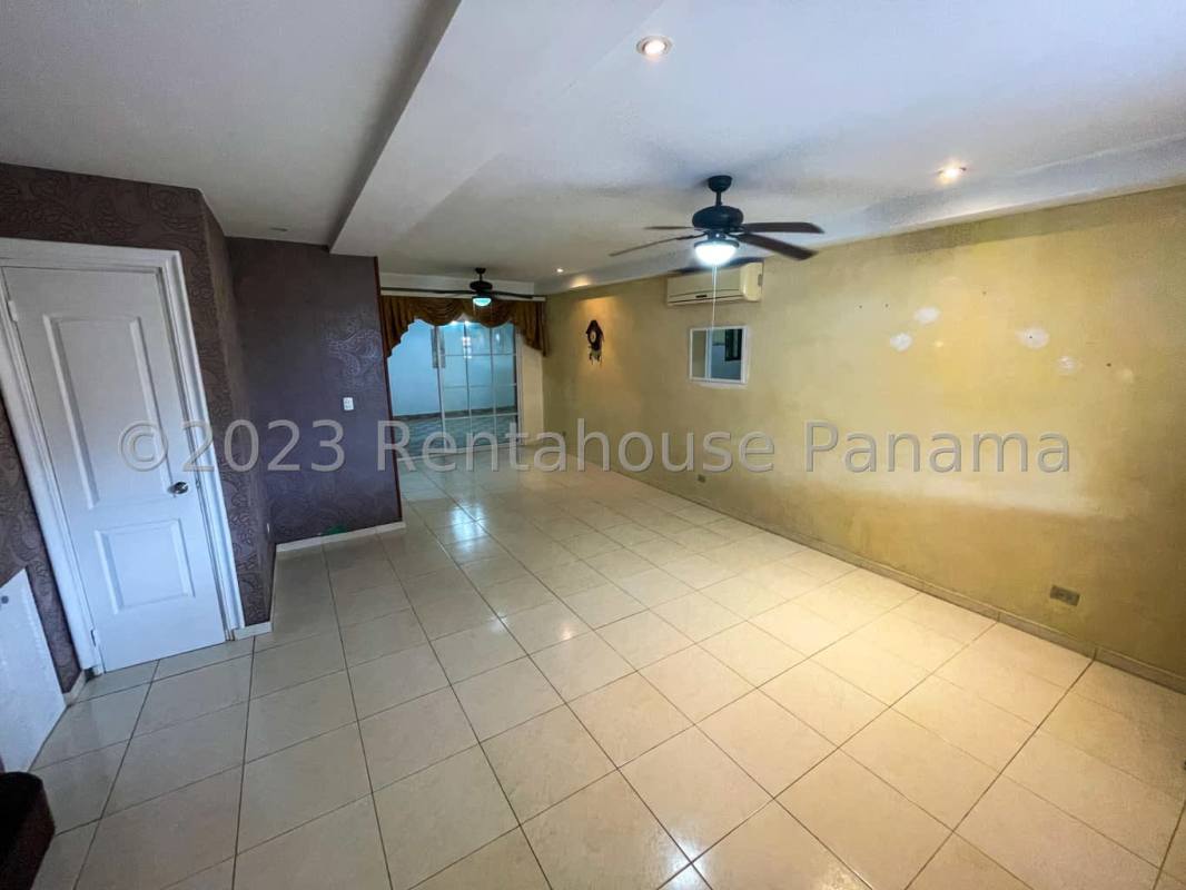 Bedroom with large window, tiled floor, ceiling fan showing house interior Cerro Viento Panama City