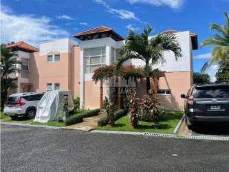 Master bedroom with large mirror, ceiling fan, sliding glass door to balcony at Rio Hato villa