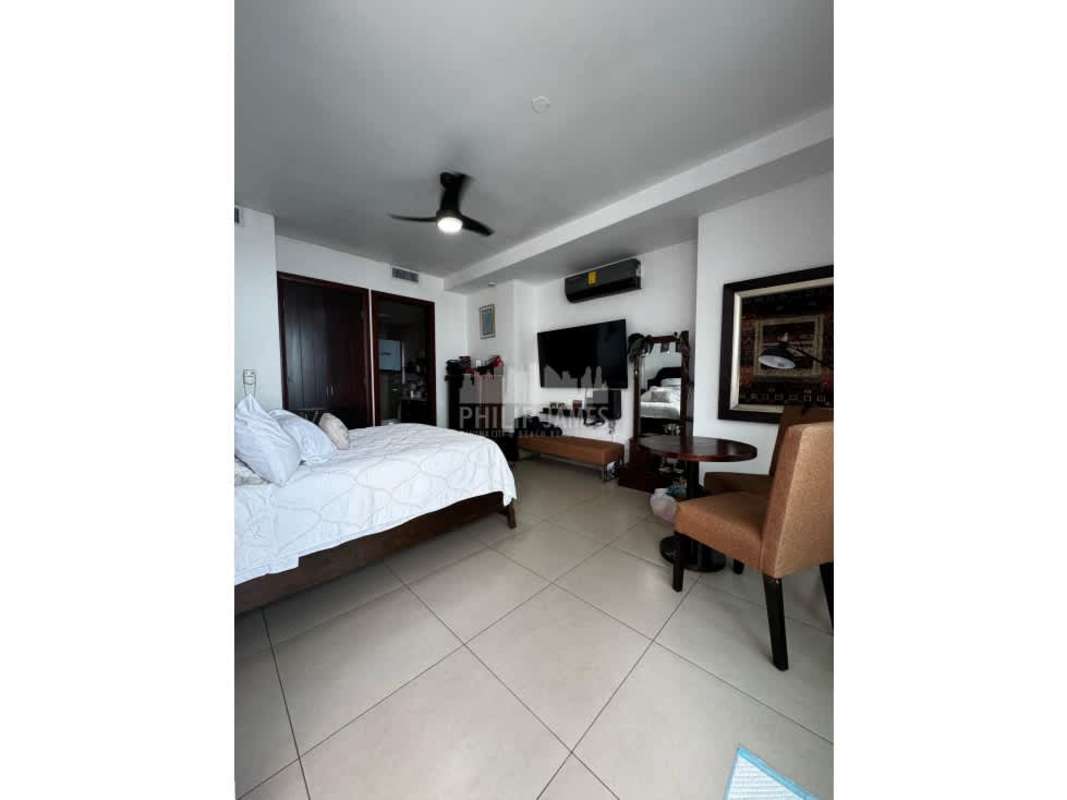 Bedroom with large window city skyline view Punta Pacifica Panama PH Oceanaire