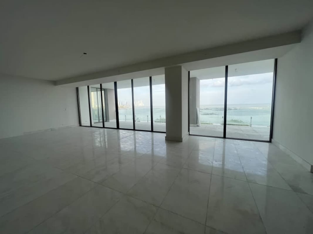 Spacious master bedroom with marble floors, large balcony with sea view at PH Ocean Reef Panama