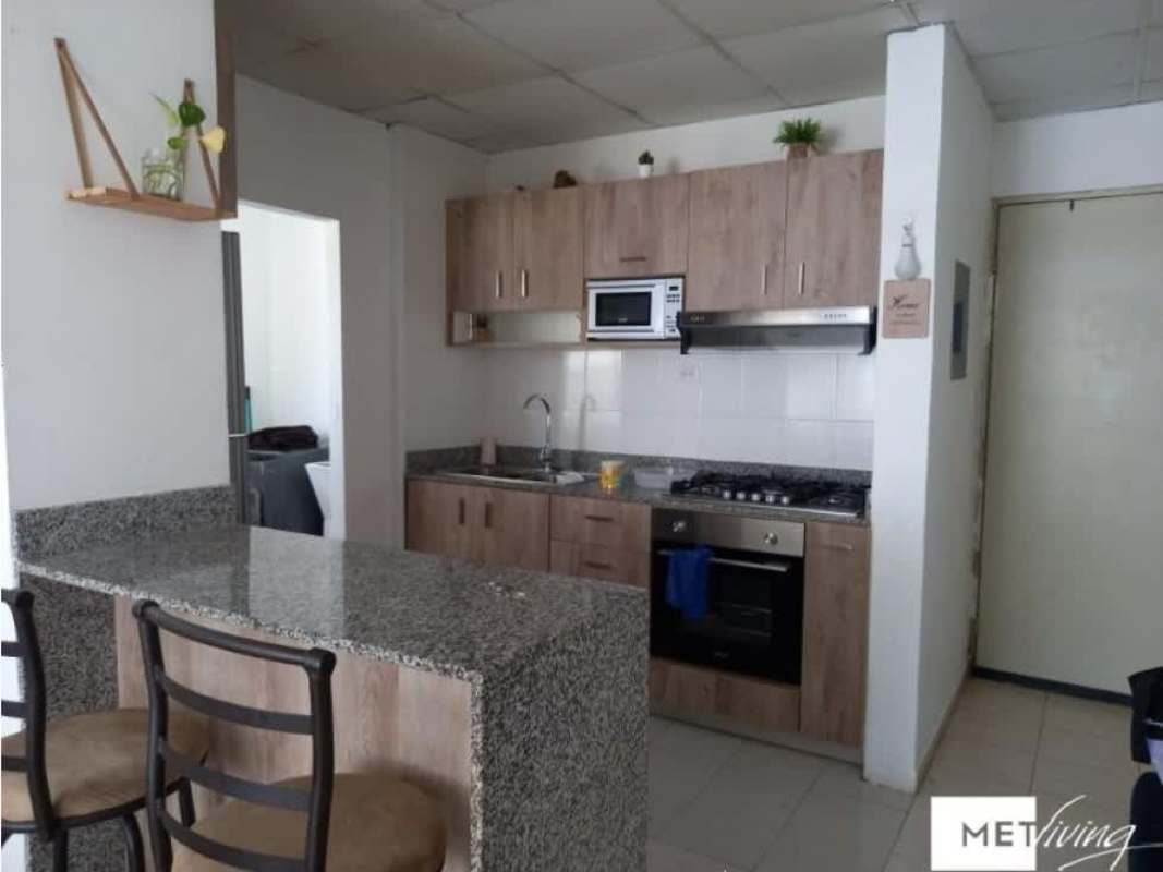 Modern kitchen design with granite, built-in appliances, and breakfast seating house for sale