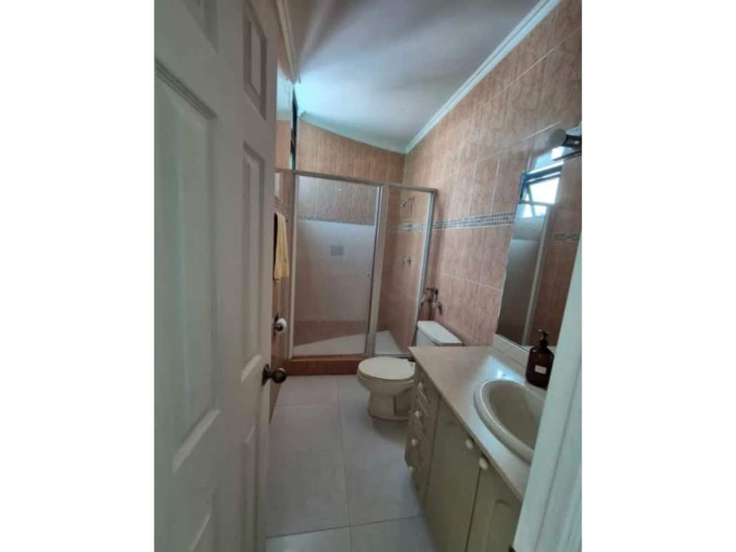 Bedroom or office with wood flooring large windows skyline view penthouse PH Marbella Panama