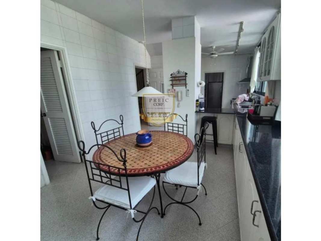 Breakfast nook with granite counters tile backsplash kitchen PH Marbella penthouse Panama City