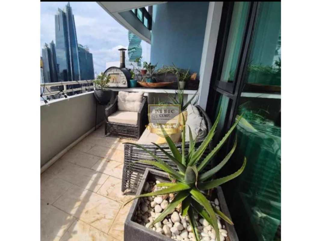 Penthouse terrace with pizza oven outdoor seating city skyline ocean view Marbella Panama