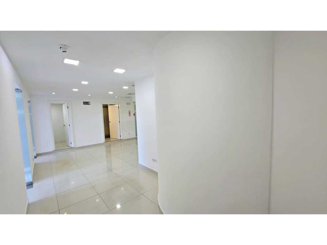 Bright minimalist reception area with glass wall in Oceania Business Plaza, Punta Pacifica