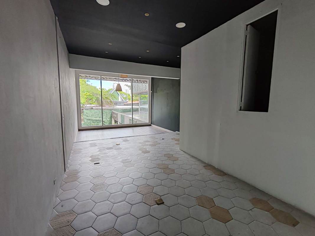 Interior commercial space with large storefront glass wall in San Francisco Panama