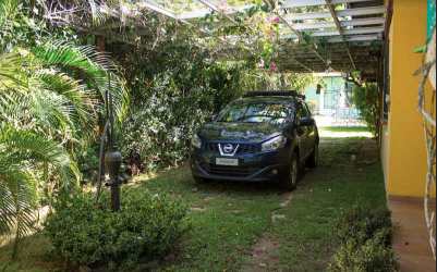 Living room with wooden furniture in beach rental Costa Esmeralda, San Carlos Panama