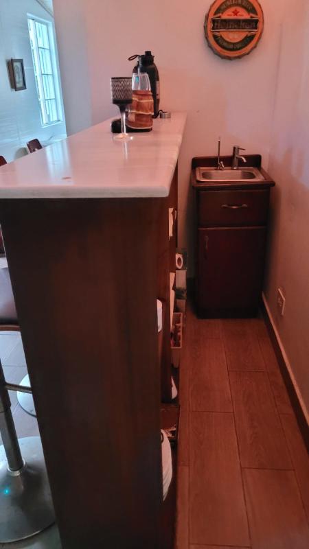 Minimalist bedroom with accent wall, closet, natural light for rent Altos de Panamá