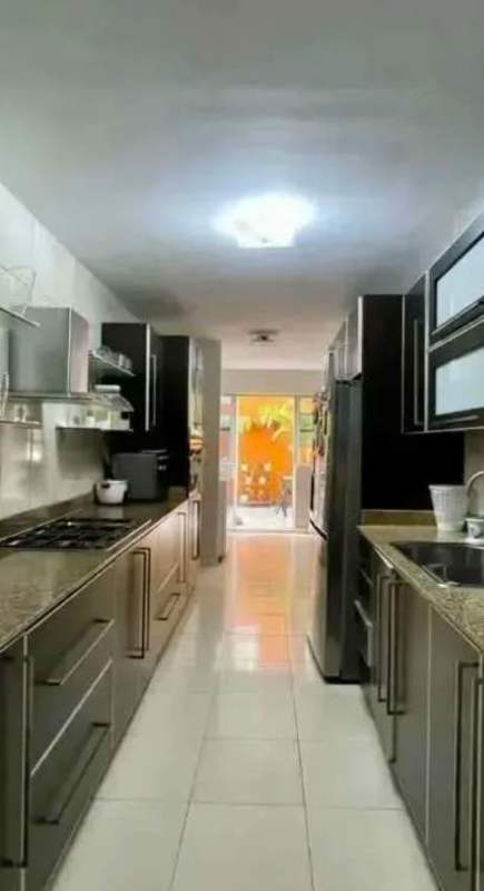 Living space with sliding doors to private terrace and AC at Aurora Tower Panama