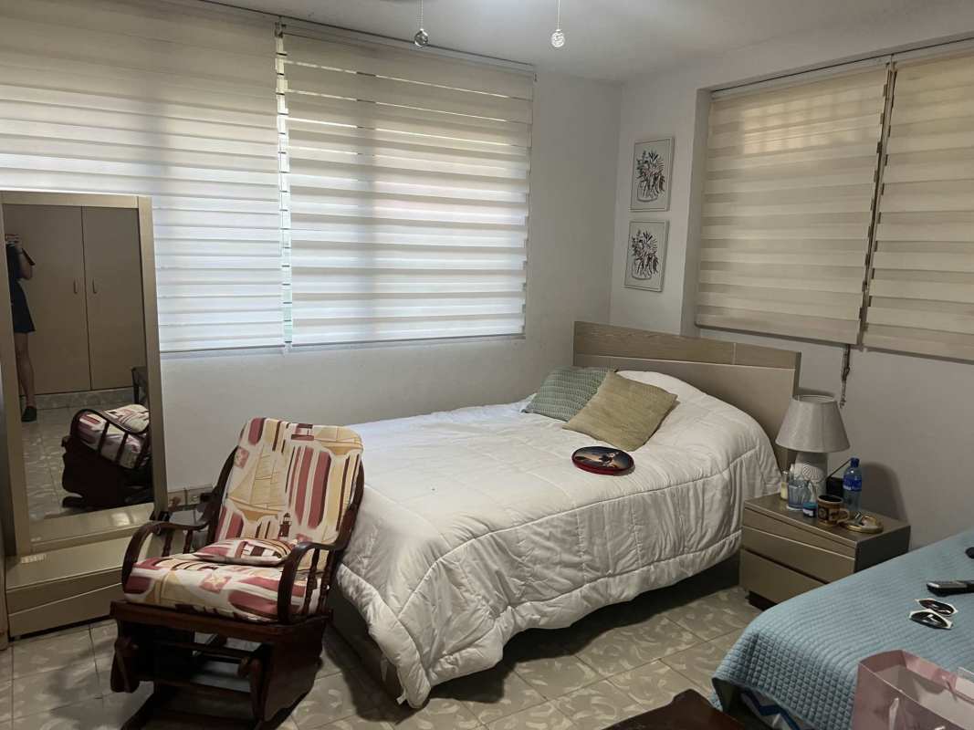 Bedroom with large windows, garden view and AC PH Vista Hermosa Panama City