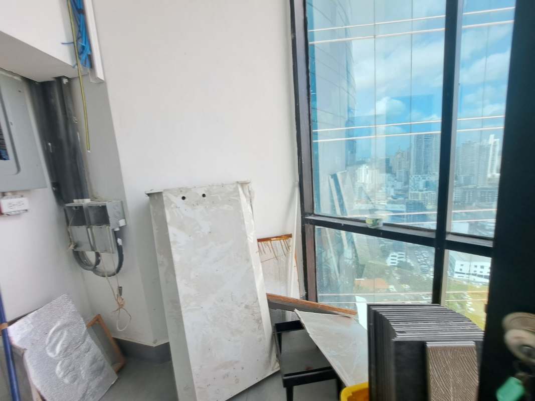 Large commercial open space with floor-to-ceiling windows panoramic skyline Torre Generali Panama City