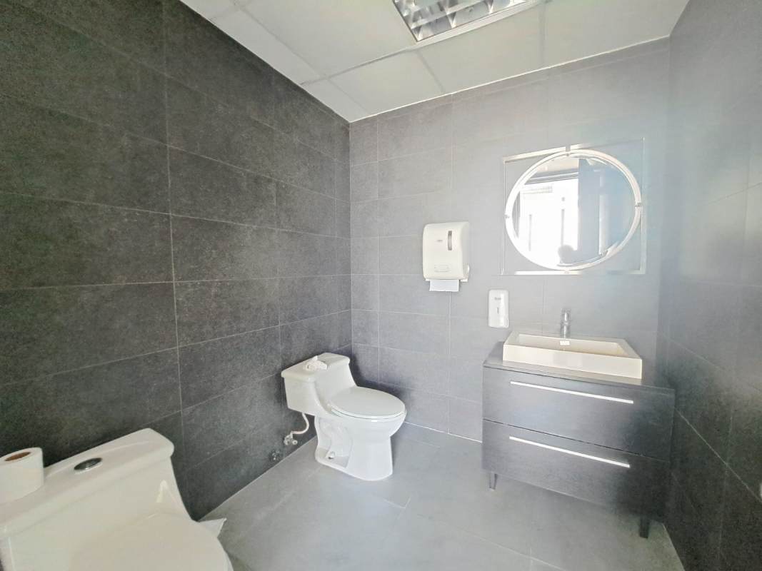 Skyline view from enclosed balcony with glass panels in Torre Generali Obarrio Panama City