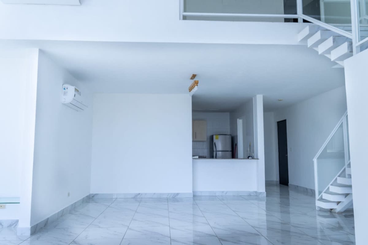 Modern kitchen equipped with granite countertops and appliances in PH Blue Park apartment Bella Vista Panama City