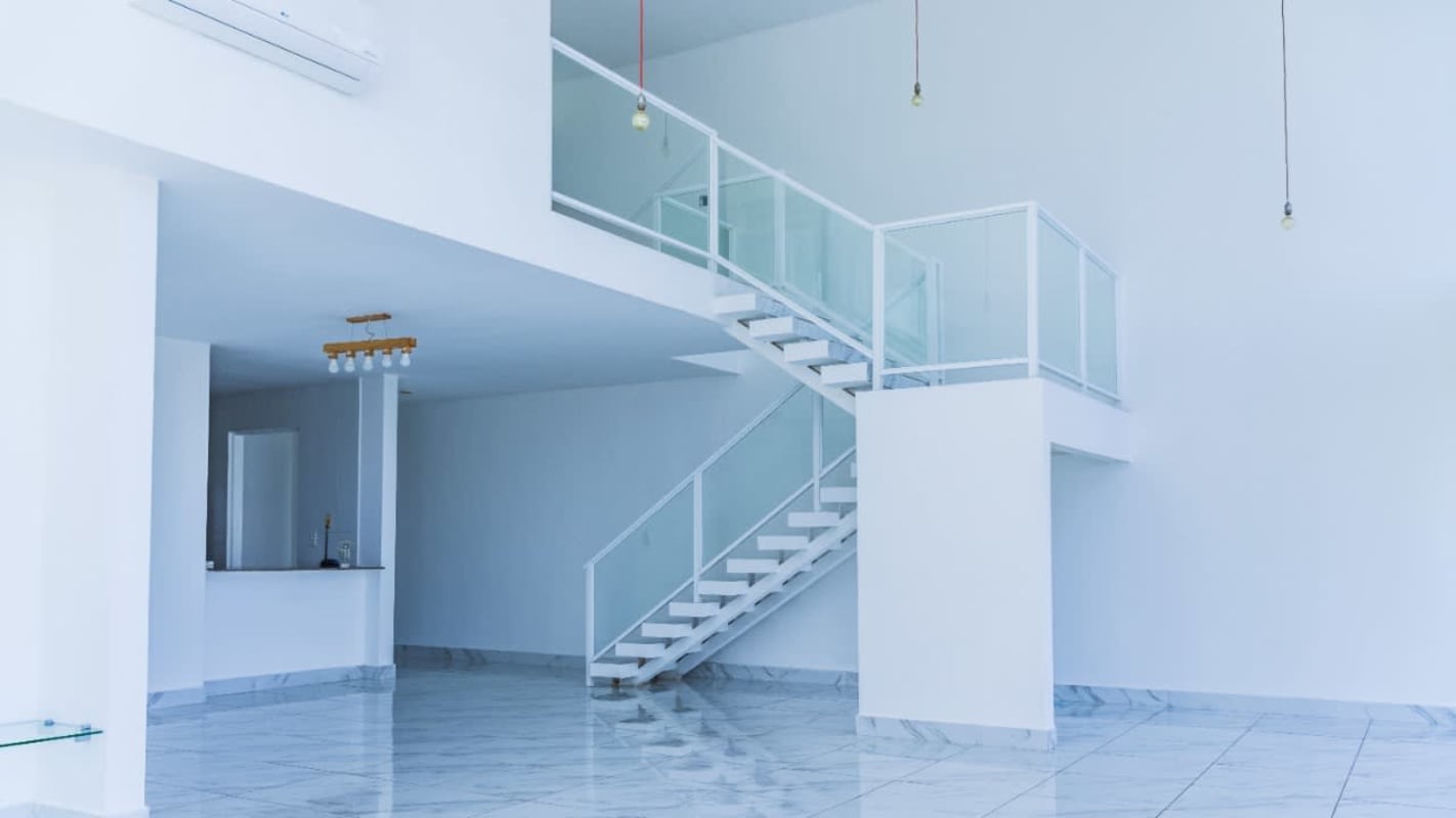 Master bedroom with large window, closet and ensuite bathroom in PH Blue Park apartment Bella Vista Panama