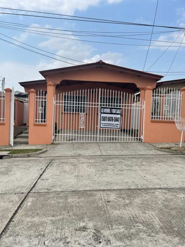 Iron gate and entry of house in Brisas del Golf gated community Panama