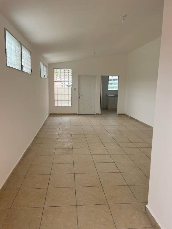 Bedroom with tile floors and natural lighting in Brisas del Golf house for sale Panama