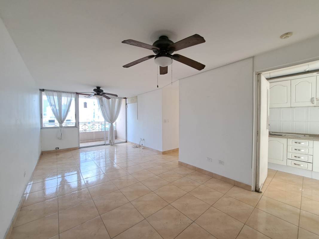 Rooftop social terrace with artificial grass and skyline views in PH Sunset Place Via Porras Panama City