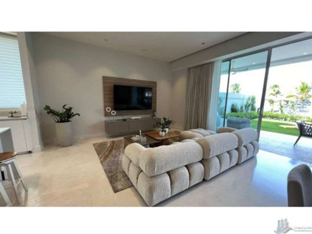 Elegant living room open to terrace and garden Ocean Reef Islands Punta Pacifica Panama