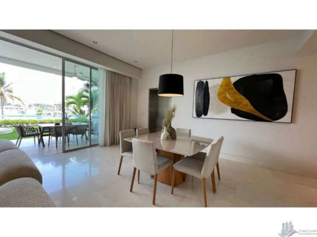 Dining space opening to private terrace in Ocean Reef Islands residence Panama