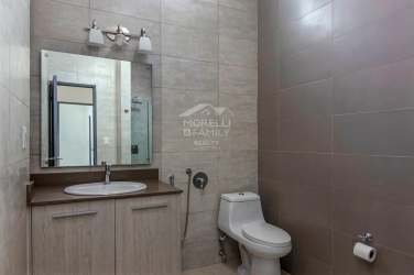 Modern bathroom with vanity porcelain tiles light colors PH Natura Costa Verde Panama