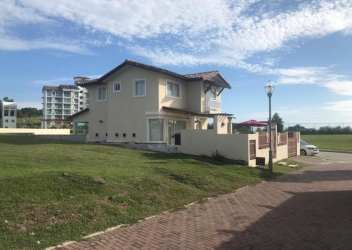 Mediterranean style two story beach house with tiled roof at PH Fontanella del Mar Panama