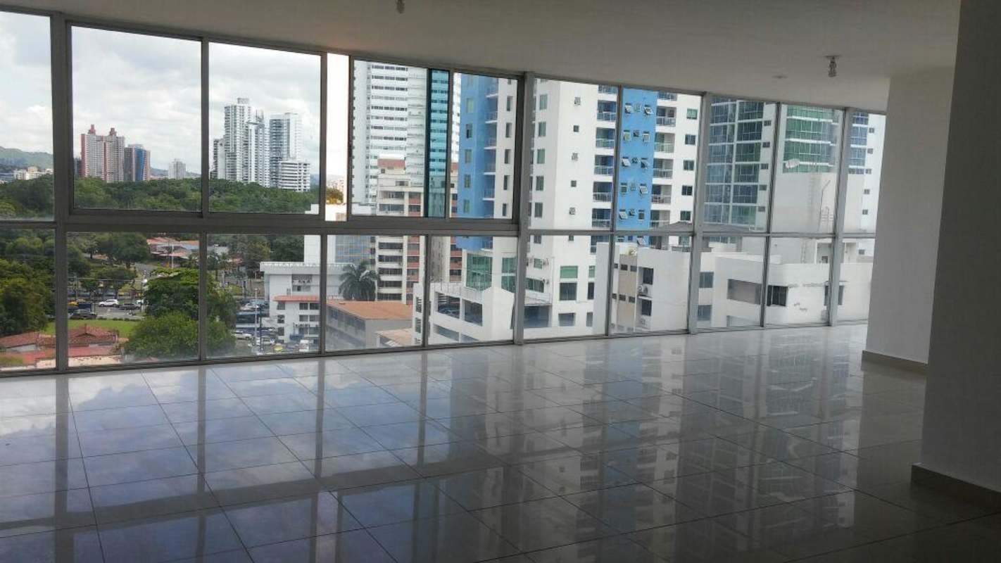 Modern apartment with large panoramic windows overlooking city skyline PH Metropolitan Park San Francisco