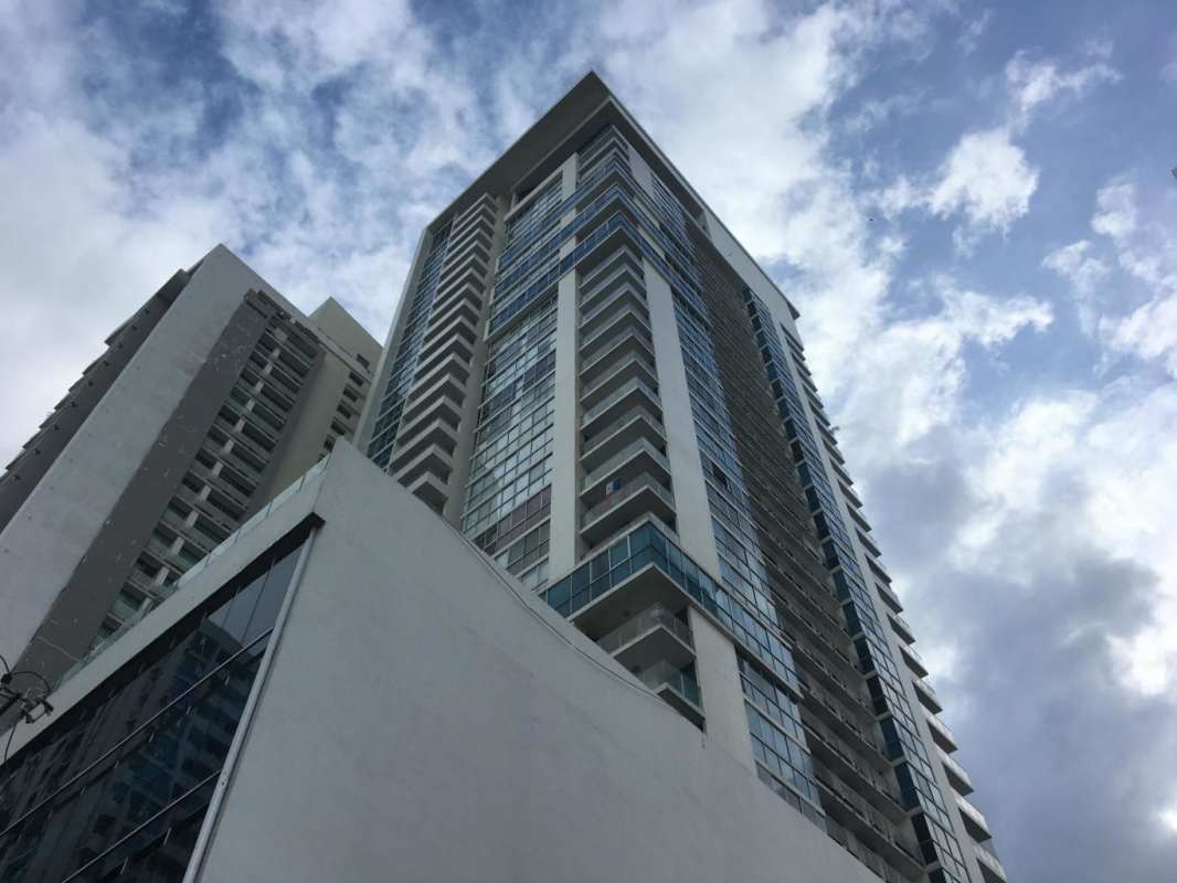 Tall condominium PH Metropolitan Park exterior facade with balconies in Panama City