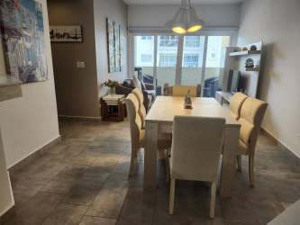 Master bedroom with large window and scenery in Forest Tower apartment for sale Panama Pacifico