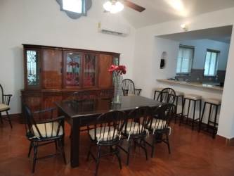 Fully equipped kitchen with granite countertops wood cabinets and stainless steel appliances at Buenaventura villa Panama