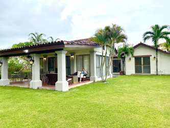 Large covered terrace with tropical garden views in Buenaventura Beach Resort luxury villa Panama