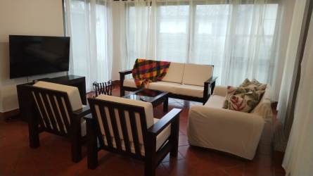 Master bedroom with ensuite bathroom garden view natural light in luxury Buenaventura resort villa Panama