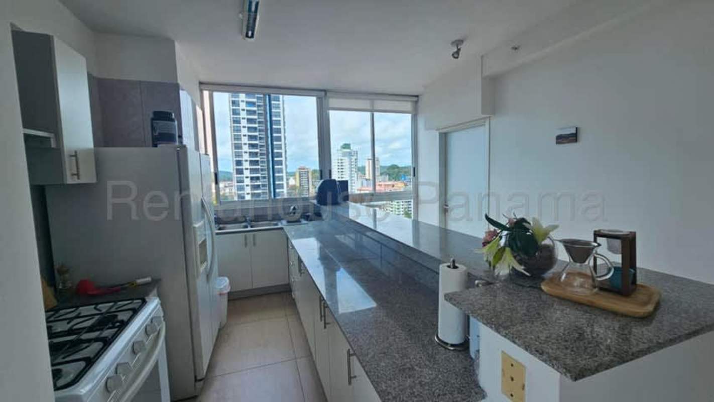Spacious bedroom with large windows, air conditioning, closet and city views at PH Vista Tower Bella Vista Panama