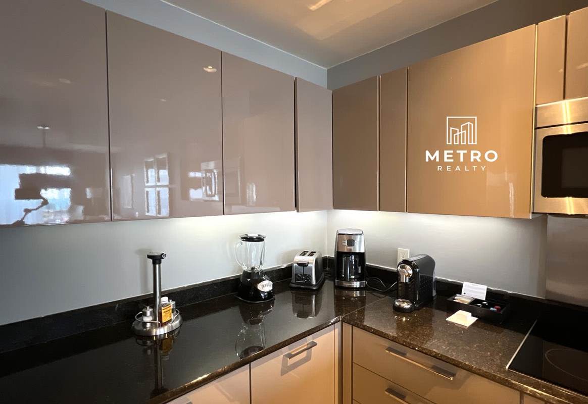 Infinity edge swimming pool with city and ocean views at Bristol Panama hotel condo