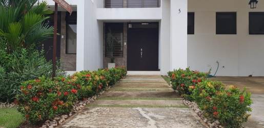 Spacious dining and living area with contemporary finishes at Puerto Madero Costa Verde House