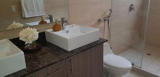 Contemporary bathroom marble counter and glass shower new house Puerto Madero Costa Verde Panama