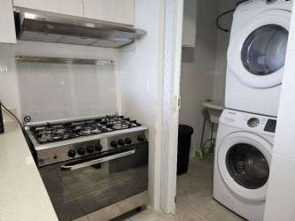 Scenic views of forest and skyline from balcony at Forest Tower Tucan Panama Pacifico