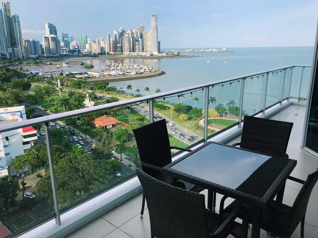 Balcony with glass railing offering amazing waterfront skyline views at PH Destiny Tower Panama City