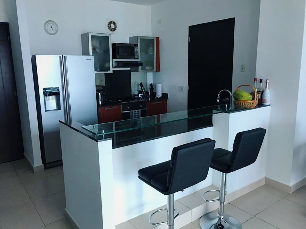 Modern kitchen with stainless appliances, glass breakfast bar Destiny Tower Panama