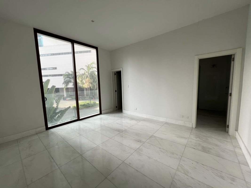 Master bedroom with walk-in closet, en-suite bath, marble floors, private oceanview balcony in Punta Pacifica