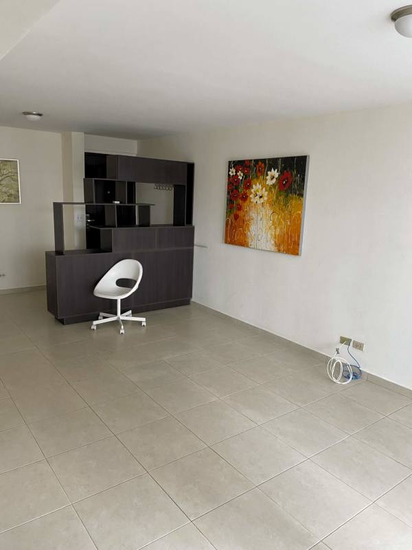 Modern living dining room with neutral tiles large windows PH Villa de las Fuentes Panama