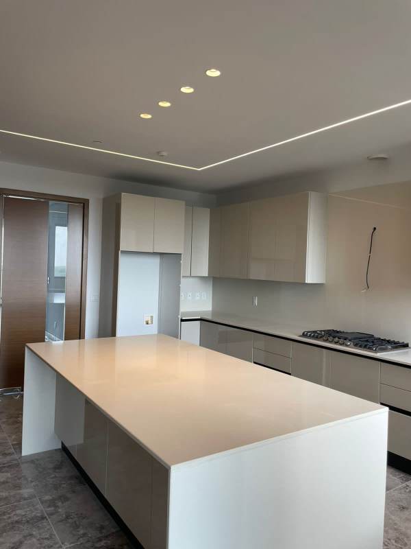 Luxury kitchen quartz countertops and center island in PH Empire Residences Santa María Panama City