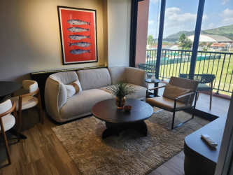 Modern bathroom with glass shower and stylish tile at PH Centriqo Panama Pacifico