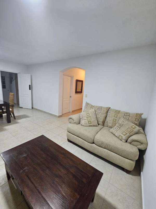 Large community pool with lounging area in Costa Sur Panama